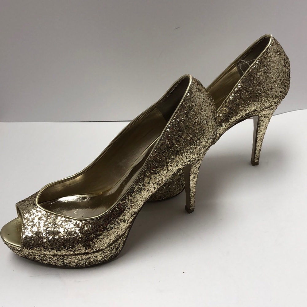 guess gold heeled shoe